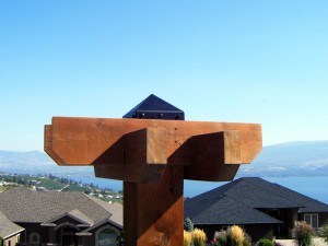 A black post cap sits on top of a Pergola Timber Post