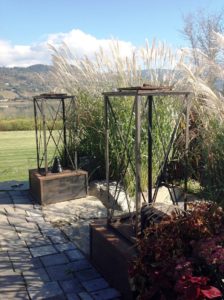 Large square brown lanterns, with an X pattern on the sides